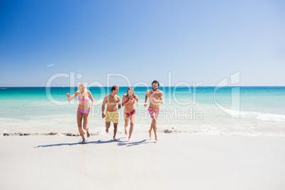 Portrait of friends posing at the beach