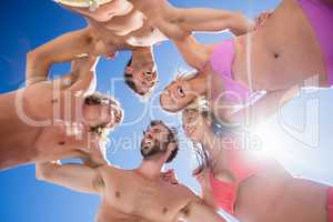 Portrait of friends posing at the beach