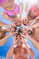 Portrait of friends posing at the beach