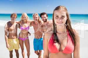 Portrait of friends posing at the beach