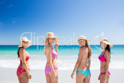 Portrait of friends posing at the beach