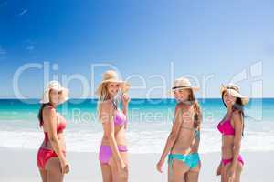 Portrait of friends posing at the beach