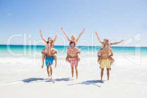 Portrait of friends posing at the beach