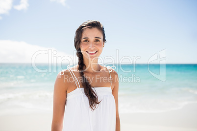 Portrait of smiling woman on the beach