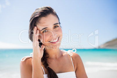 Portrait of smiling woman on the beach