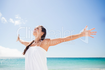 Portrait of smiling woman on the beach