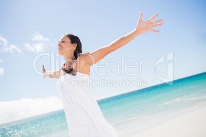 Portrait of smiling woman on the beach