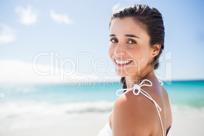 Portrait of smiling woman on the beach