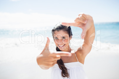 Portrait of smiling woman on the beach