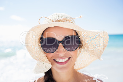 Portrait of smiling woman on the beach