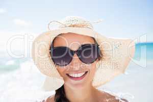 Portrait of smiling woman on the beach