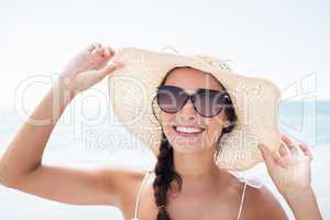 Portrait of smiling woman on the beach