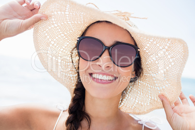 Portrait of smiling woman on the beach