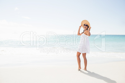 Portrait of smiling woman on the beach