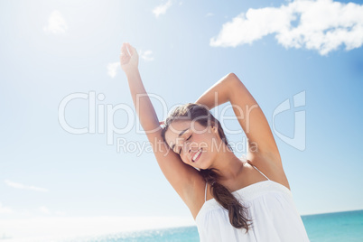 Portrait of smiling woman on the beach