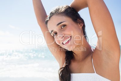 Portrait of smiling woman on the beach