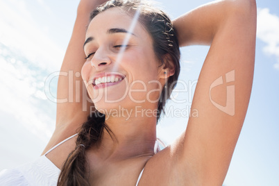 Portrait of smiling woman on the beach