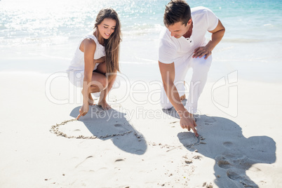 Couple drawing a heart