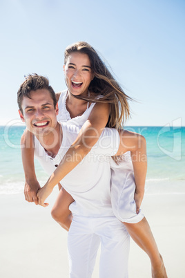 Portrait of handsome man holding his girlfriend Portrait of handsome man holding his girlfriend