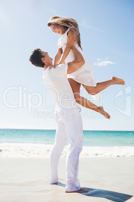 Portrait of handsome man holding his girlfriend Portrait of handsome man holding his girlfriend