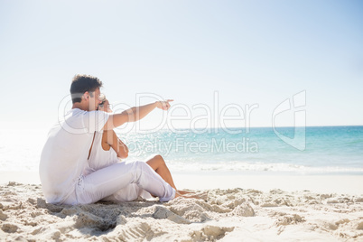 Cute couple sitting down