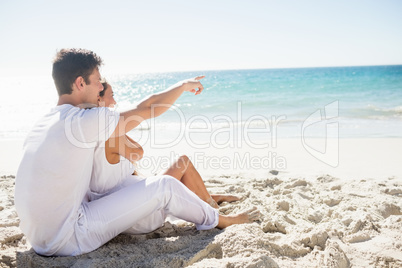 Cute couple sitting down