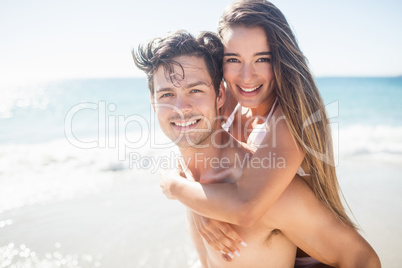 Front view of cute couple embracing
