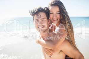 Front view of cute couple embracing