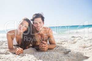 Cute couple lying and smiling