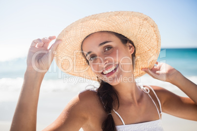 Happy woman posing on the beach