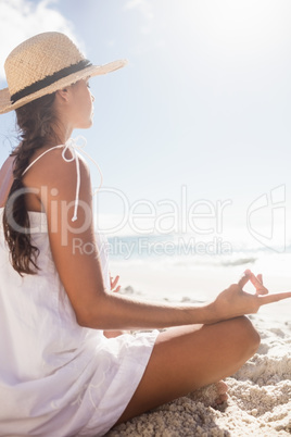 Rear view of woman performing yoga