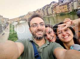 Three friends while taking a Selfie in Florence