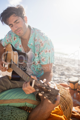 Man playing the guitar