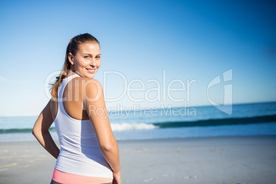 Woman standing at the beach