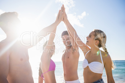 Friends giving high-five