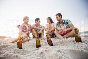 Smiling friends sitting