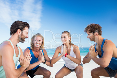People exercising on the beach