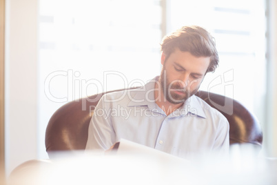 A businessman taking notes