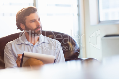 A businessman taking notes