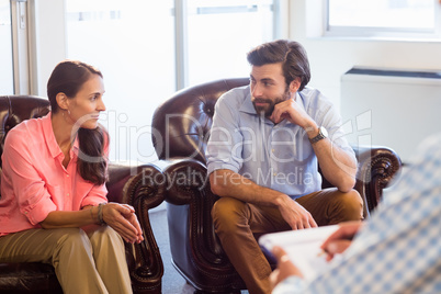 Psychologist helping a couple with relationship difficulties
