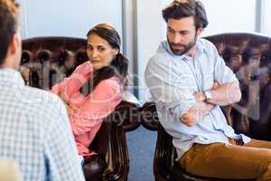 Psychologist helping a couple with relationship difficulties