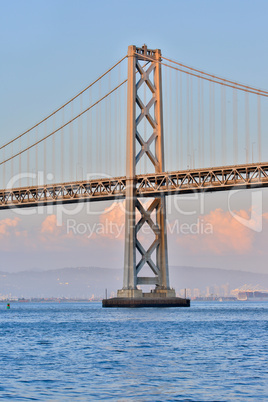 Oakland-San Francisco Bay Bridge close-up, from Pier 14, San Francisco, Sunset