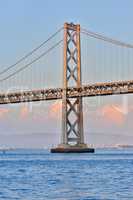 Oakland-San Francisco Bay Bridge close-up, from Pier 14, San Francisco, Sunset