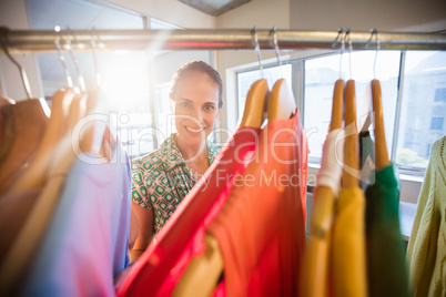 Woman posing with clothes