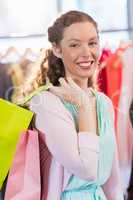 Woman wearing shopping bags