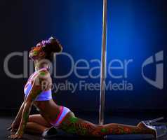 Image of nightclub dancer with luminous bodyart