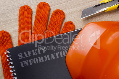 Industrial safety helmet, gloves and safety book
