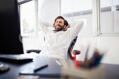 Happy businessman relaxing