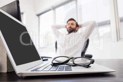 Happy businessman relaxing