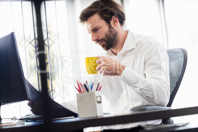 Businessman drinking coffee